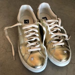 Gold and white star sneakers from VEJA x Madewell